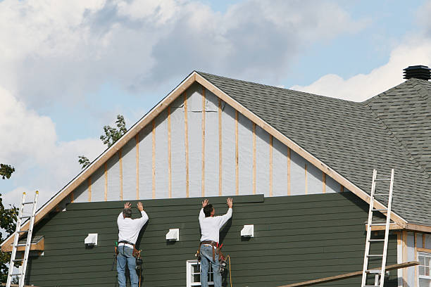 Professional Siding Replacement technician working in Parksley, VA